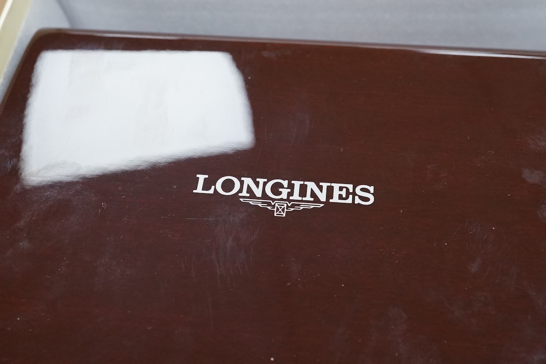 A gentleman's gtwo tone gilt steel Longines L4709-2 Le Grand Classique quartz dress wrist watch, with Roman dial, case diameter 33mm, boxed